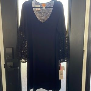 Little black dress with lace sleeves
